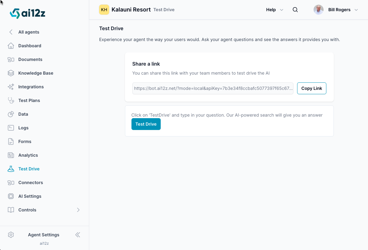 The interface includes a left-hand navigation bar with options such as &#39;All Agents&#39;, &#39;Dashboard&#39;, &#39;Documents&#39;, &#39;Knowledge Base&#39;, &#39;Prompts&#39;, &#39;Data&#39;, &#39;Analytics&#39;, and &#39;Test Drive&#39;, which is currently highlighted. The main area of the screen is dedicated to the &#39;Test Drive&#39; feature where users can experience the AI Agent by asking questions and receiving answers. There&#39;s a section titled &#39;Share a link&#39; with a URL provided and a &#39;Copy Link&#39; button next to it. Below, there is an input field labeled &#39;Ask a new question...&#39; with an &#39;Ask AI&#39; button, accompanied by a prompt instructing users to type in their question and click the button for an AI-powered search answer.